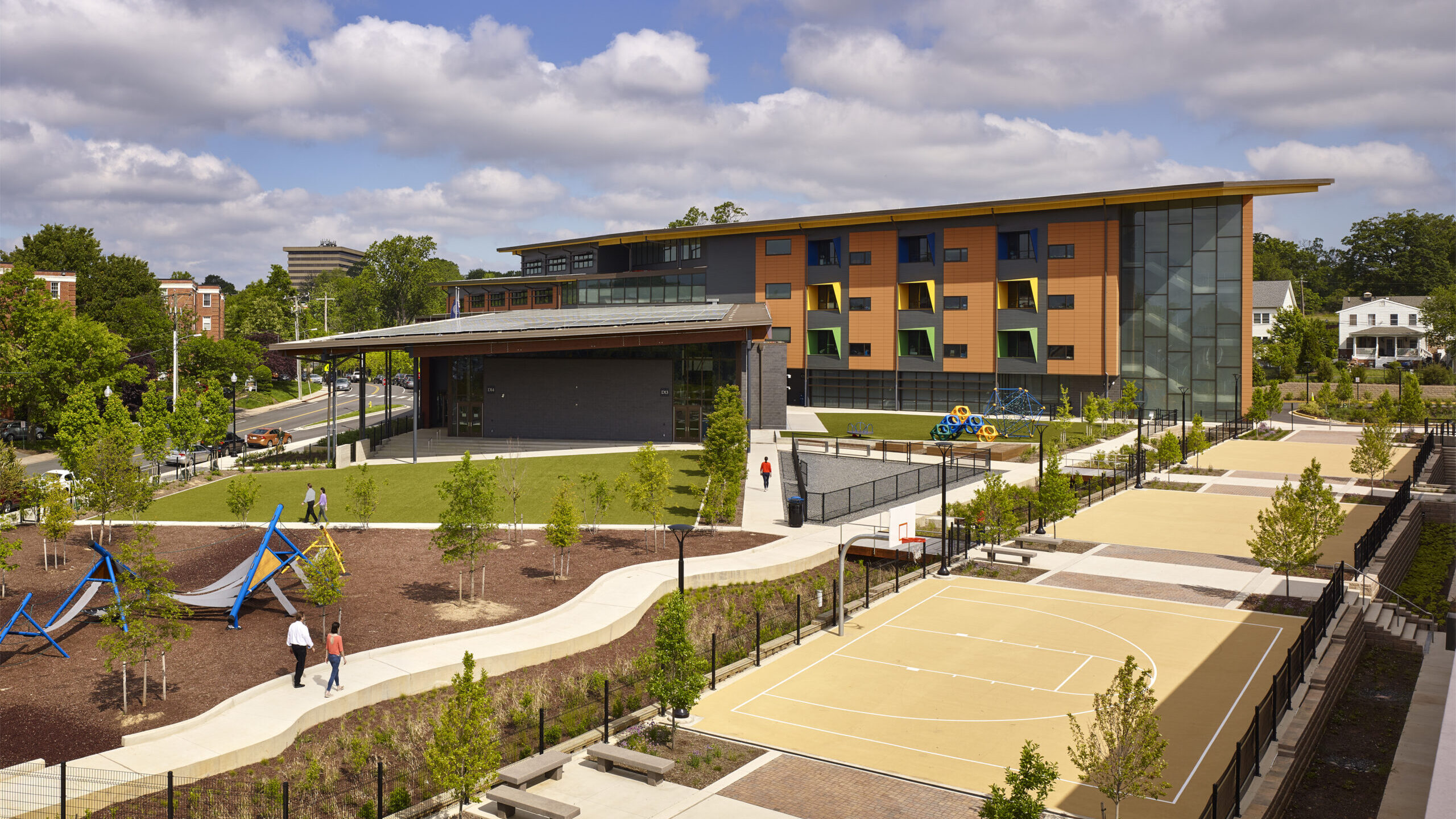 Fleet Elementary School Exterior with Playground and Basketball Court